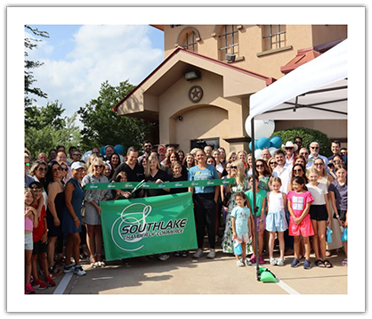 Crowd outside dental practice for ribbon cutting ceremony