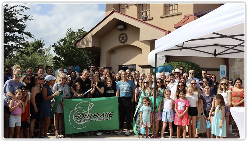 Crowd outside of office for ribbon cutting