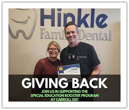 Dr. Hinkle receiving a certificate