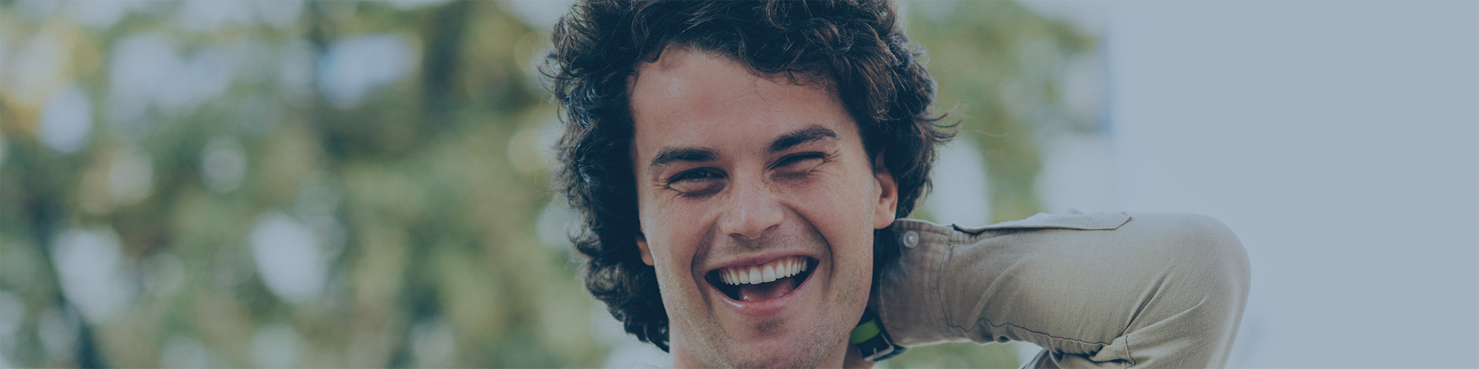 Close up of person smiling outside