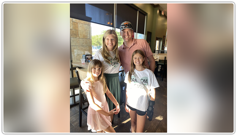 Dr. Hinkle with family at volunteer event