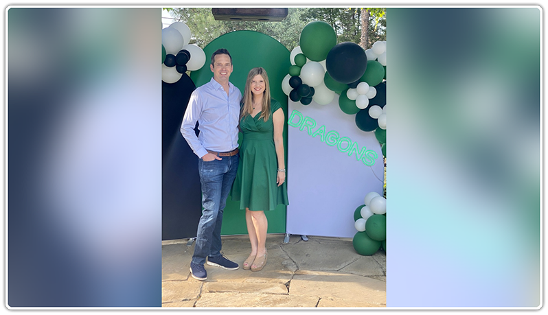 Man and woman volunteering at Dragons Care event