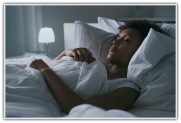 Woman sleeping peacefully in bed