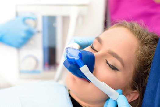 A woman getting nitrous oxide sedation near Westlake