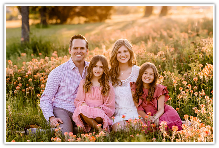 Dr. Hinkle in field of flowers