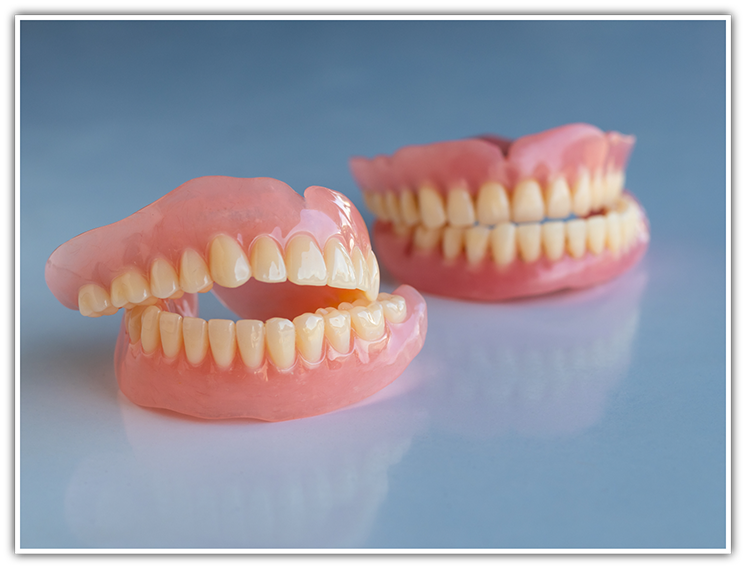 Two sets of full dentures