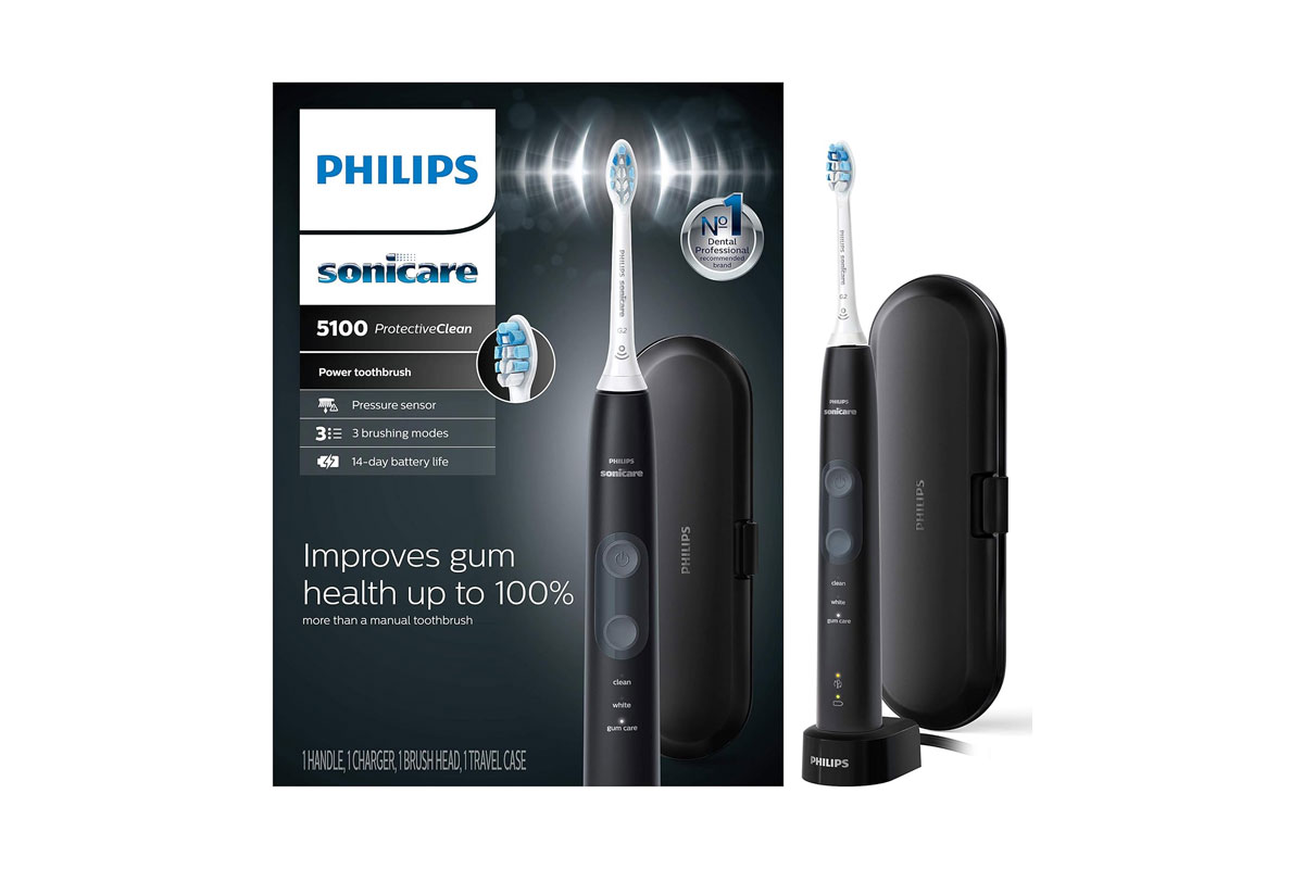 Philips Sonicare toothbrush sitting next to box