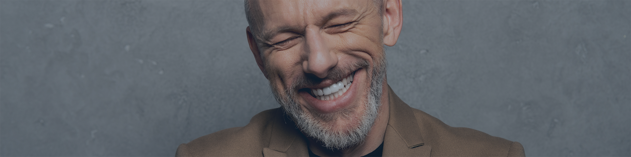 Close up of bearded man smiling