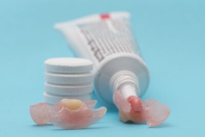 Dentures with denture adhesive on them.