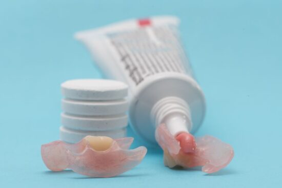 Dentures with denture adhesive on them.